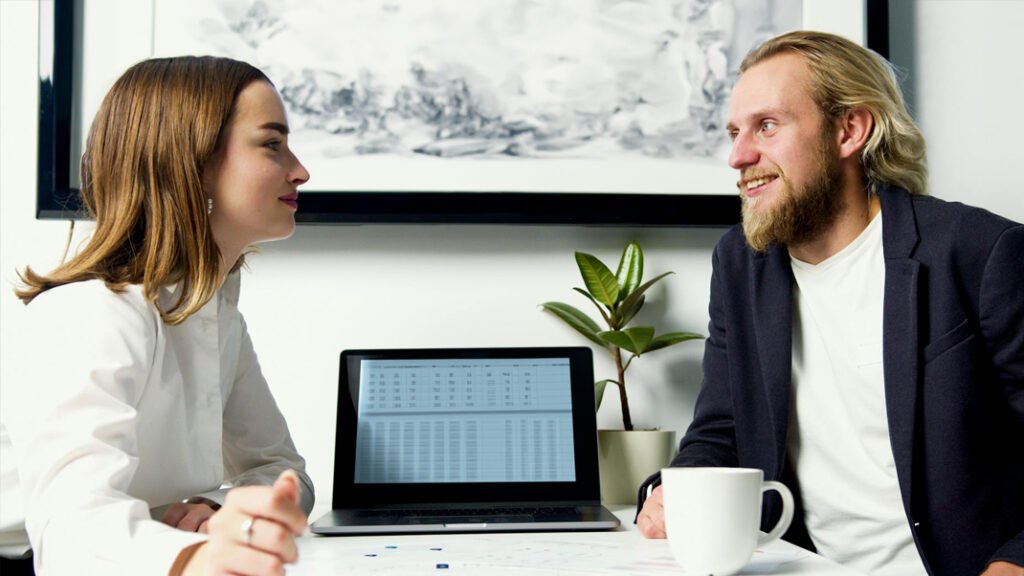 A couple discussing their finances, happily