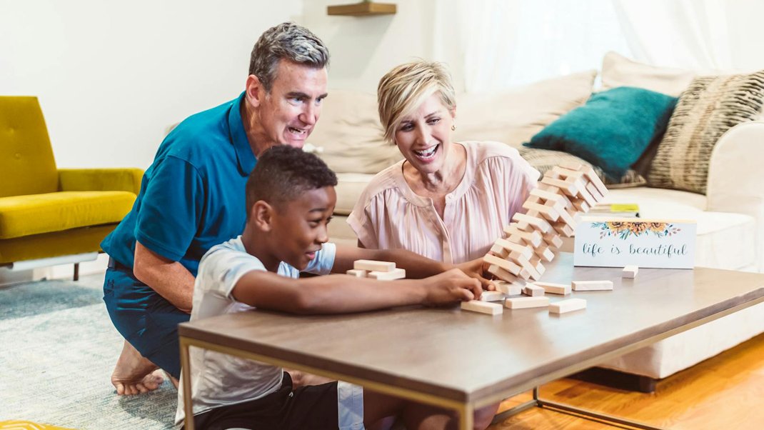 Family playing Jenga
