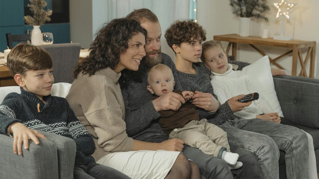 Family, enjoying a movie night together